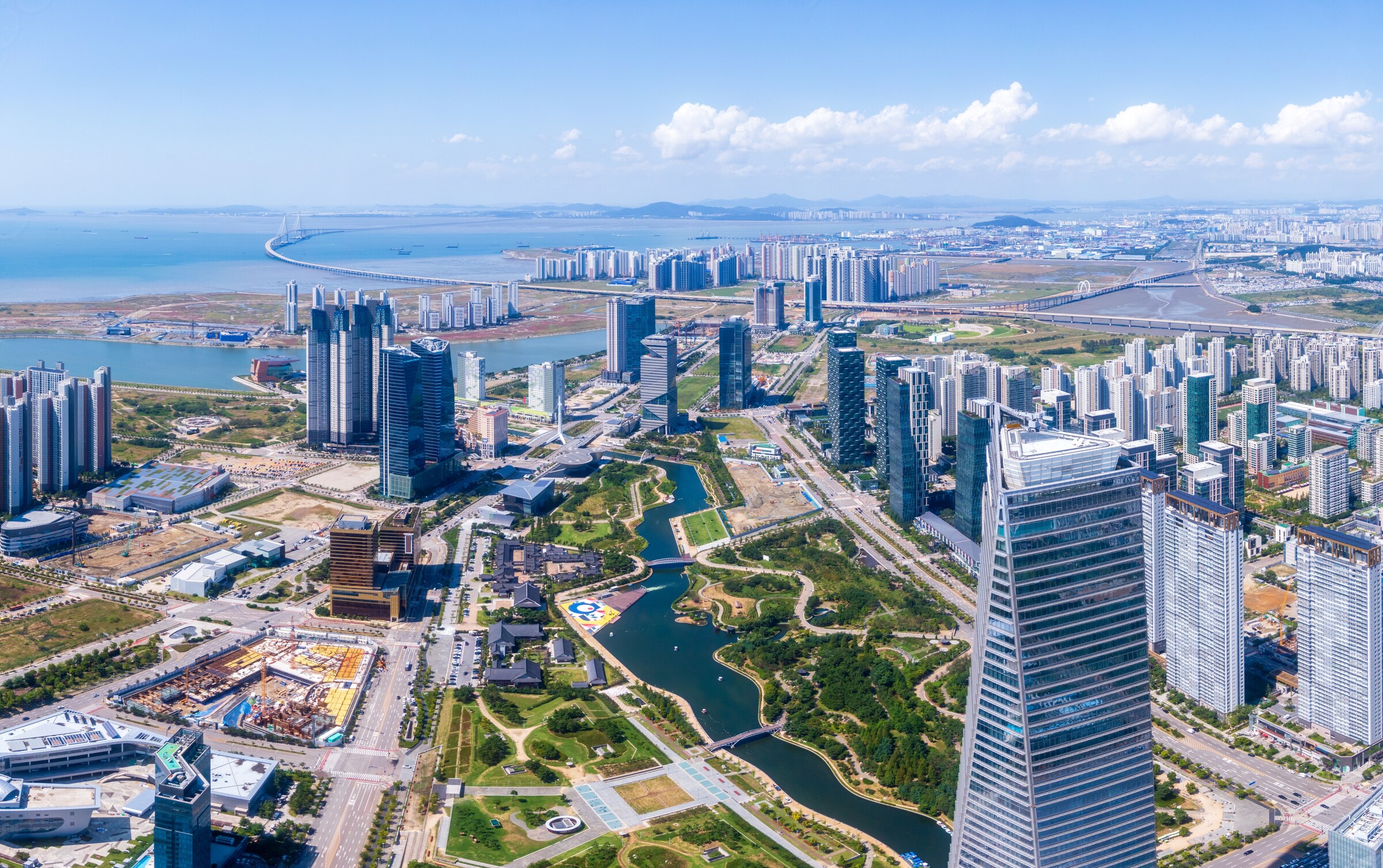 Aerial view of Songdo Central Park's waterway framed by the city skyline